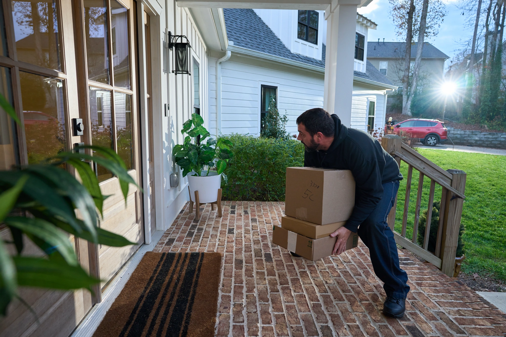 Alarm.com ADC-VDB775 monitoring suspicious package activity at an entryway
