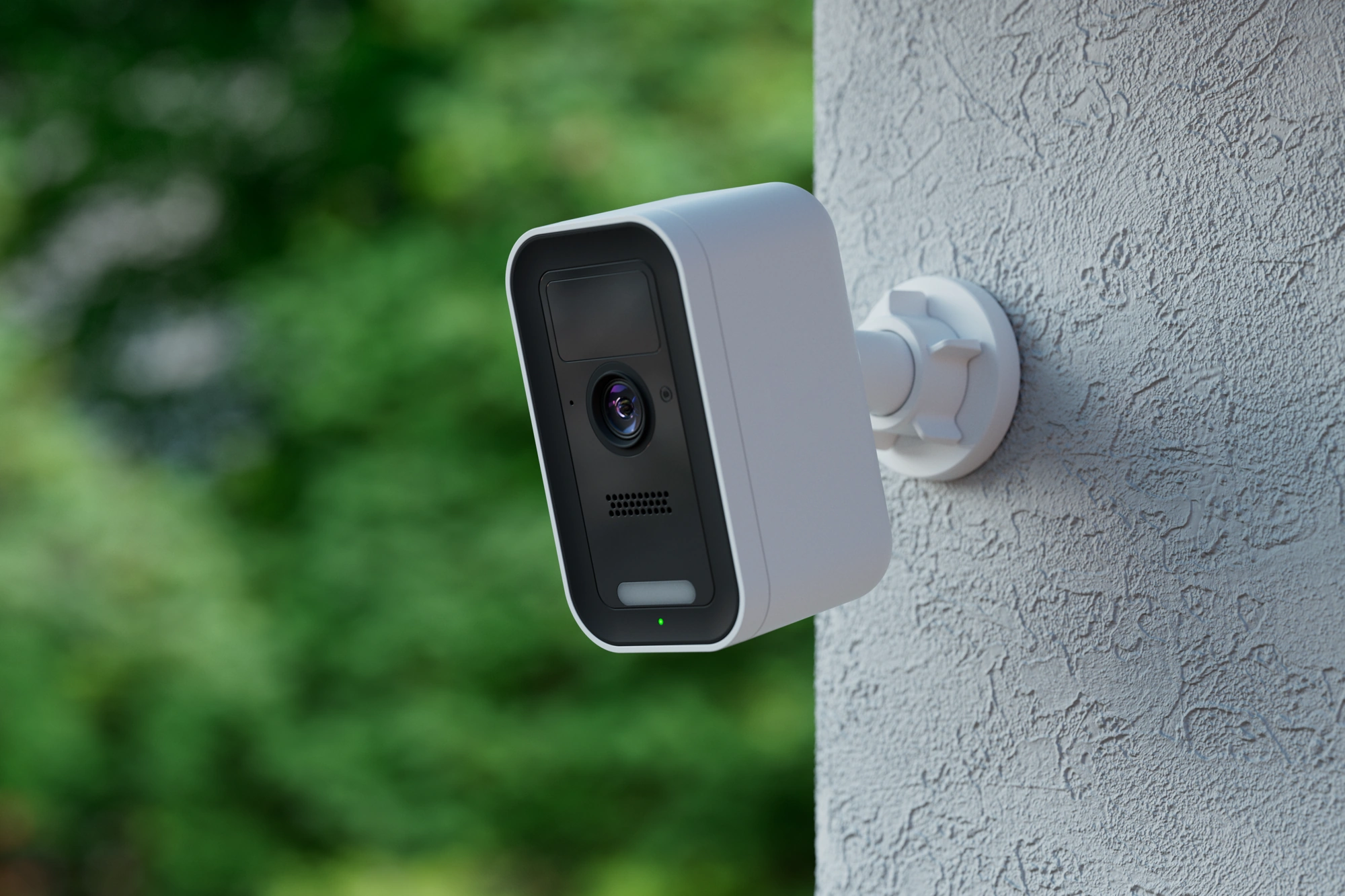 Alarm.com ADC-V731B monitoring a property in daylight