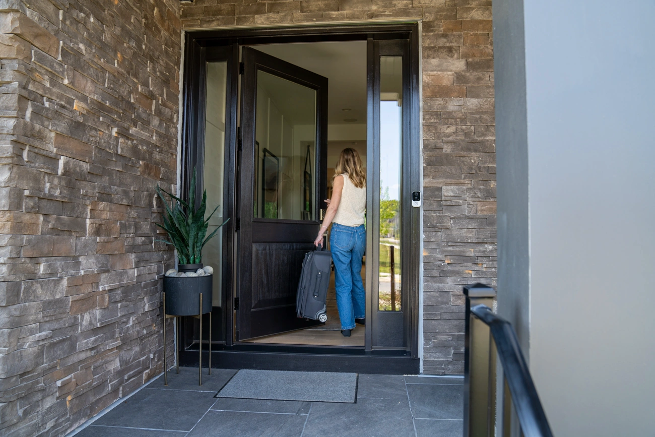 Alarm.com ADC-VDB755P monitoring a residential front entry
