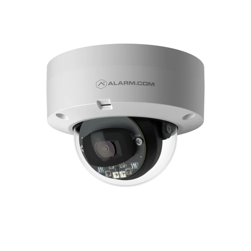 Angled view of the Alarm.com ADC-VC827P white dome camera